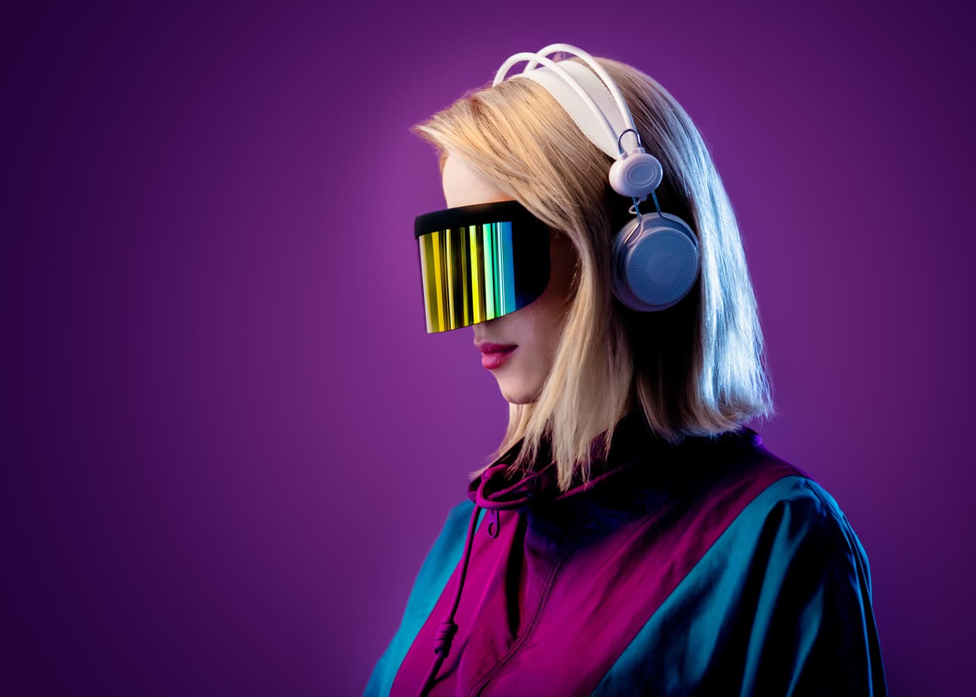 Futuristic headphones in purple studio light